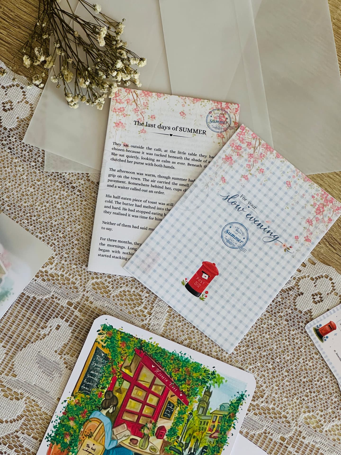 An opened envelope, letter, pencil sketch and pressed flower